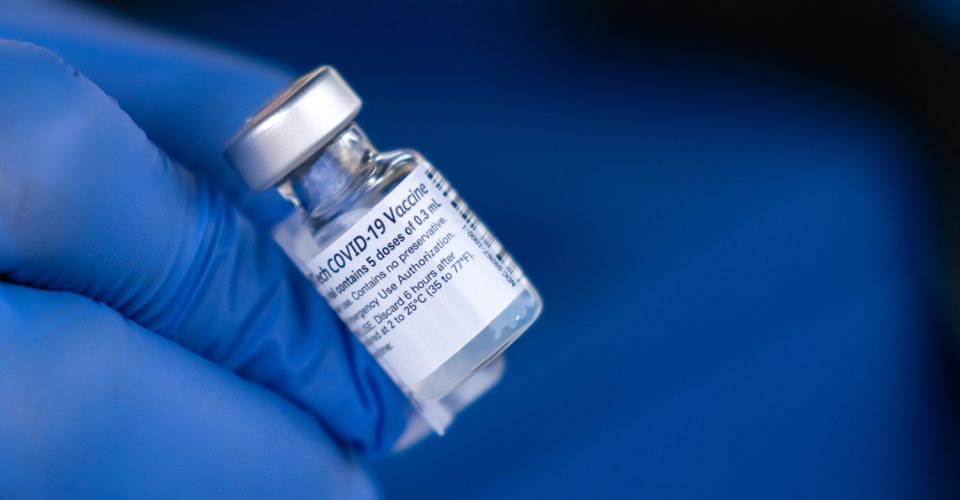 SAVANNAH, GA - DECEMBER 15: A nurse shows off a vial  of the Pfizer-BioNTech COVID-19 vaccine outside of the Chatham County Health Department on December 15, 2020 in Savannah, Georgia. Georgia Governor Brian Kemp was on hand to witness initial administering of vaccines in the state. (Photo by Sean Rayford/Getty Images)